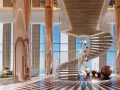 staircase-with-rose-gold-pillars-safa-2XX1X.webp